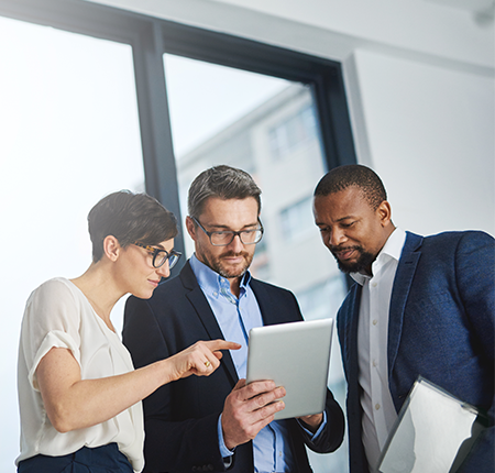 People looking at a laptop
