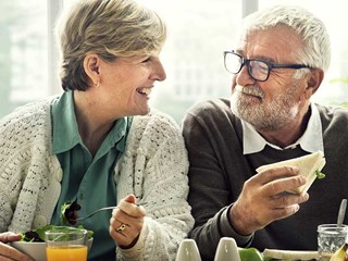 older couple eating lunch
