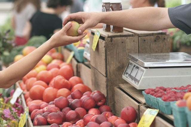 shopper buying apples