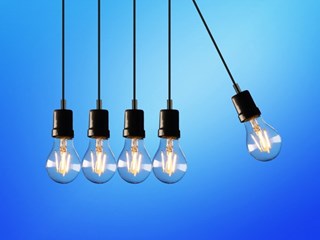 light bulbs in front of blue background