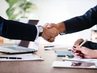 business people shaking hands