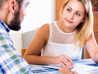 a couple discussing finances