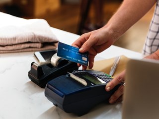 woman shopping using bank card