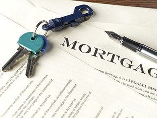 mortgage documents with keys