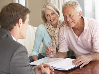 elderly couple and advisor