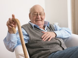elderly man in chair