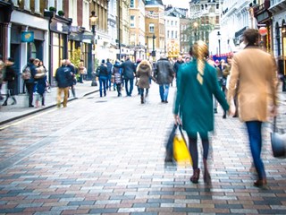 People walking through a high street
