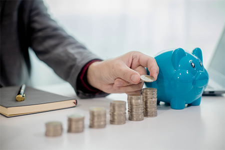 Piggy bank + coin stacks