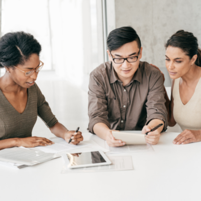 young couple having a discussion with a financial advisor