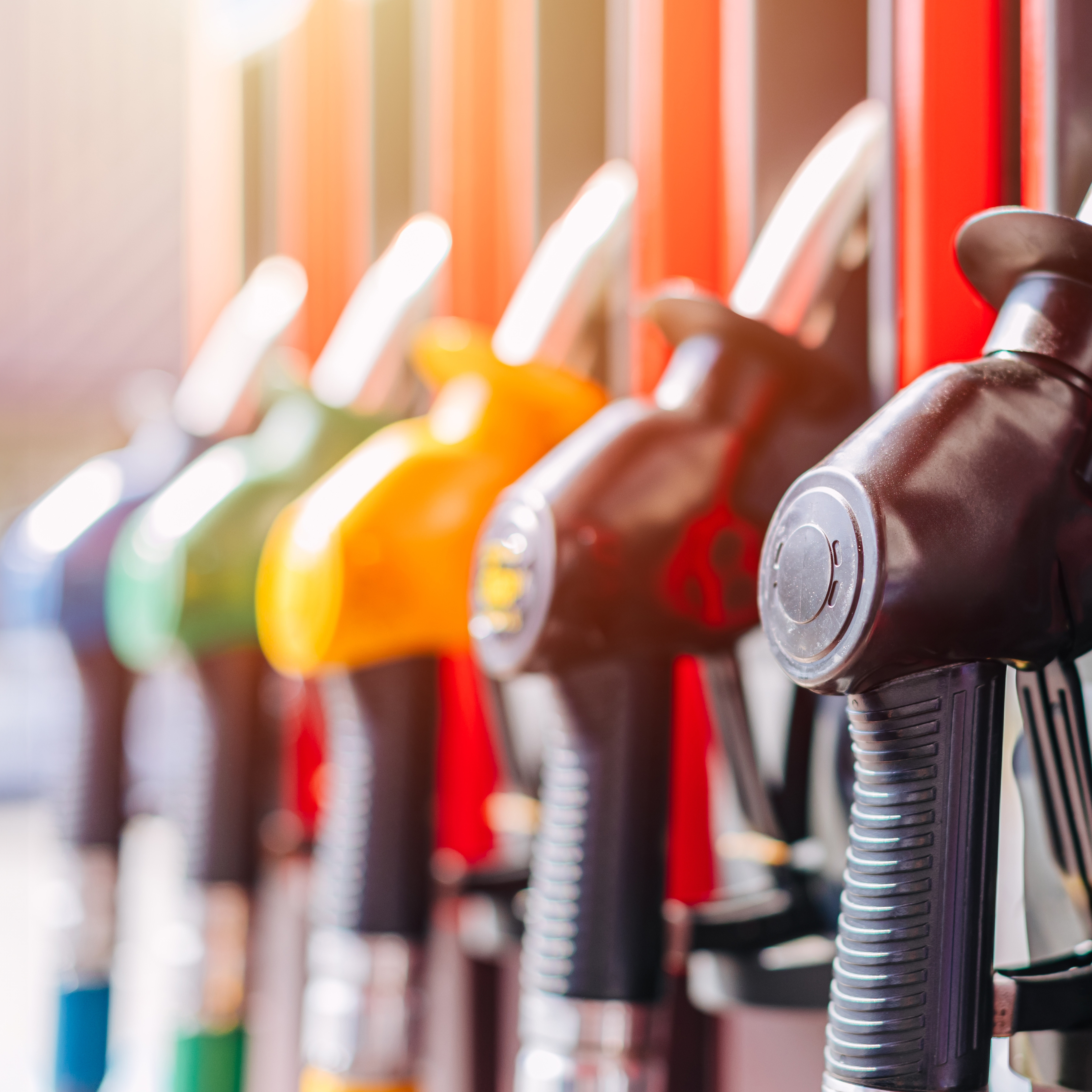 Five petrol pumps in a line