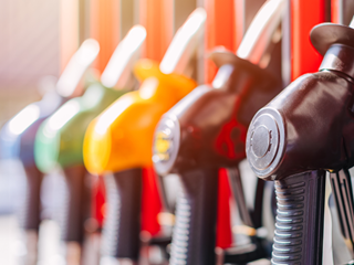 Five petrol pumps in a line