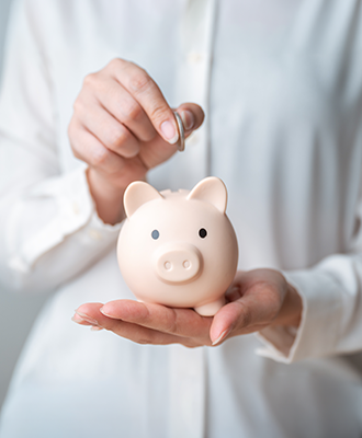 Coin into piggy bank