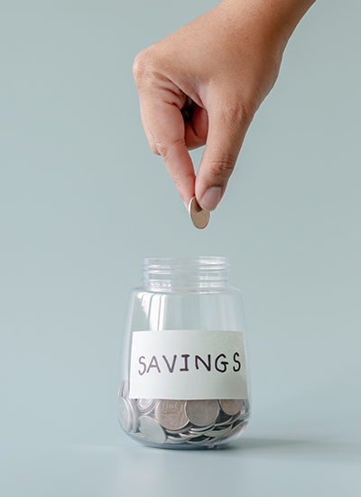 Coin dropped into jar