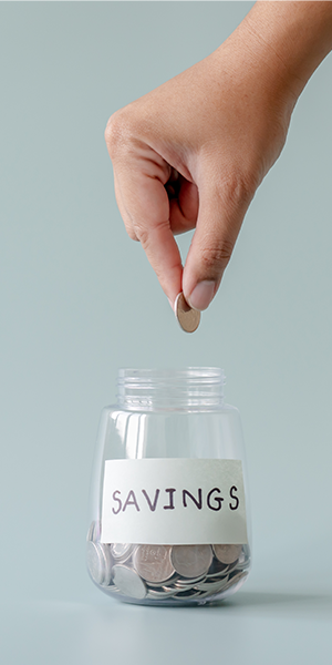 Coin dropped into jar