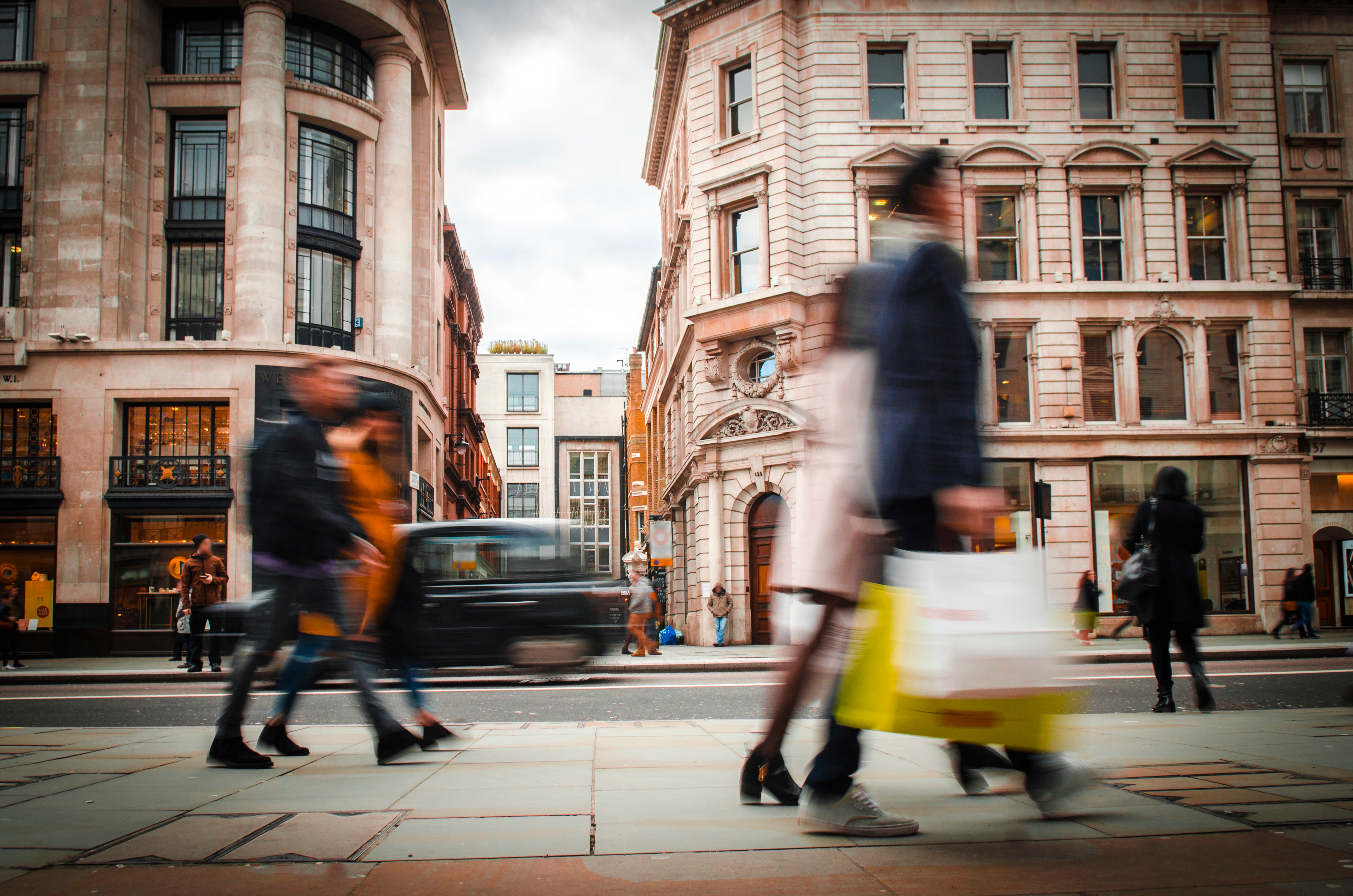 people walking in a busy street