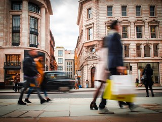people walking in a busy street
