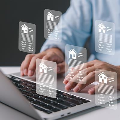 Person browsing mortgage deals online using laptop