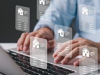 Person browsing mortgage deals online using laptop
