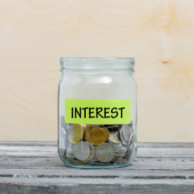 coins in a jar labelled interest