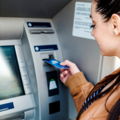 woman using an atm machine