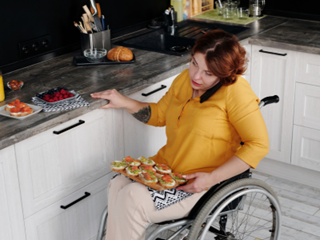 Person in a wheelchair | Finances if you're living with a disability