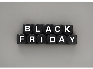 Black Friday written in on black letter tiles