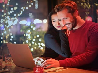 Couple shopping online, Christmas 2023
