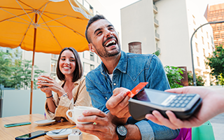 Man paying with his credit card