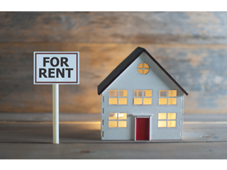 For rent sign next to model home