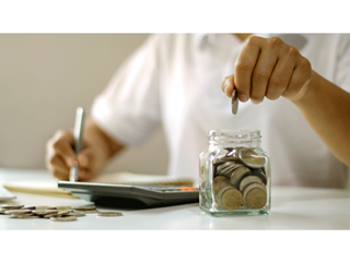 Person calculating savings interest