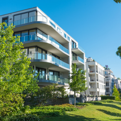 Block of flats overlooking trees and grass