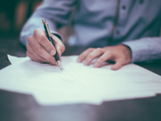 Man doing paperwork at a desk