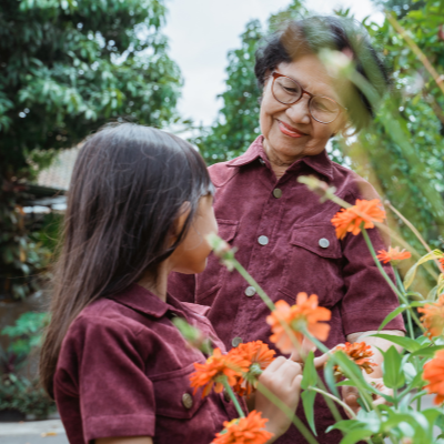 A woman and child gardening